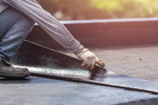 Professional Waterproofing technician working in Latonia, KY